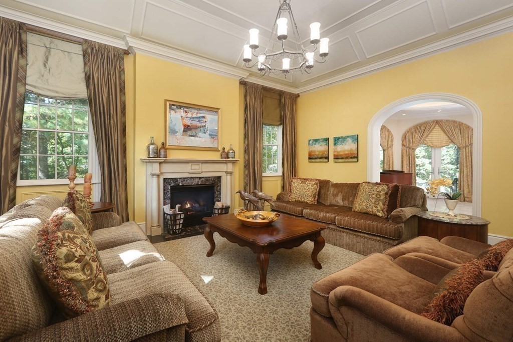 177 Bridle Trail Road Needham, MA 02492 - Photo 5 of 41 a living room with furniture and a fireplace