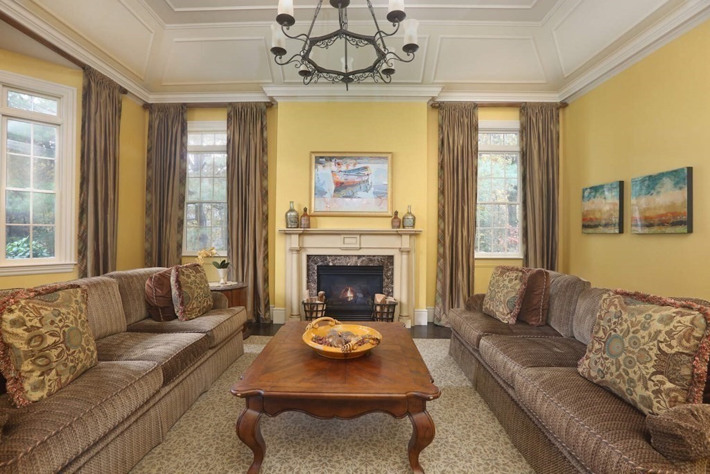177 Bridle Trail Road Needham, MA 02492 - Photo 6 of 41 a living room with furniture and a fireplace