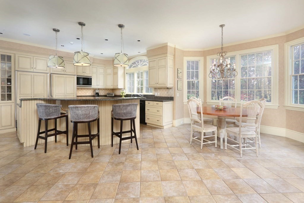 177 Bridle Trail Road Needham, MA 02492 - Photo 8 of 41 a large dining space with furniture