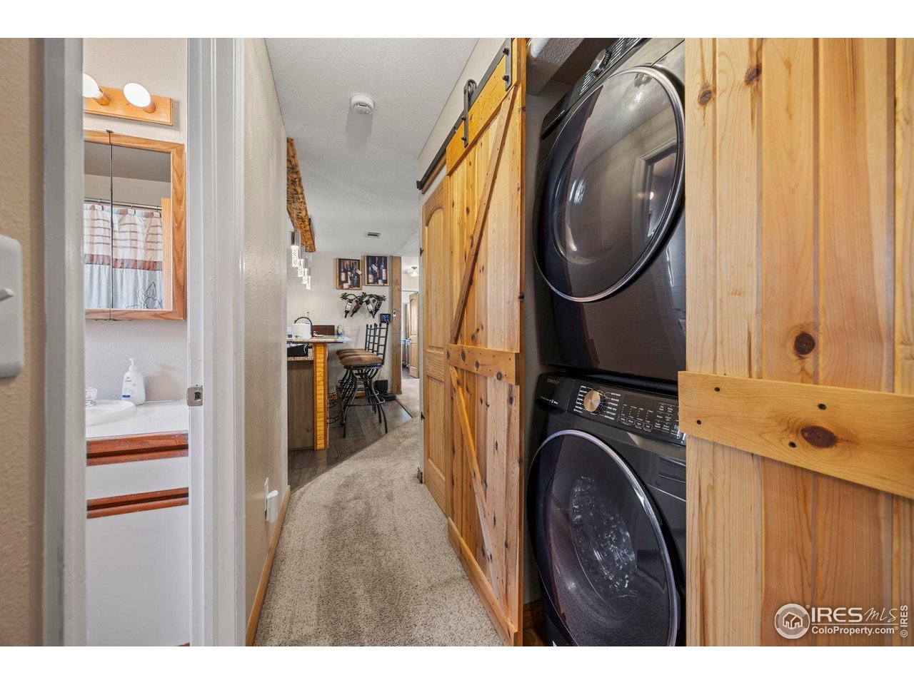 210 2nd Street Mead, CO 80542 - Photo 22 of 29 a view of a bedroom with washer and dryer