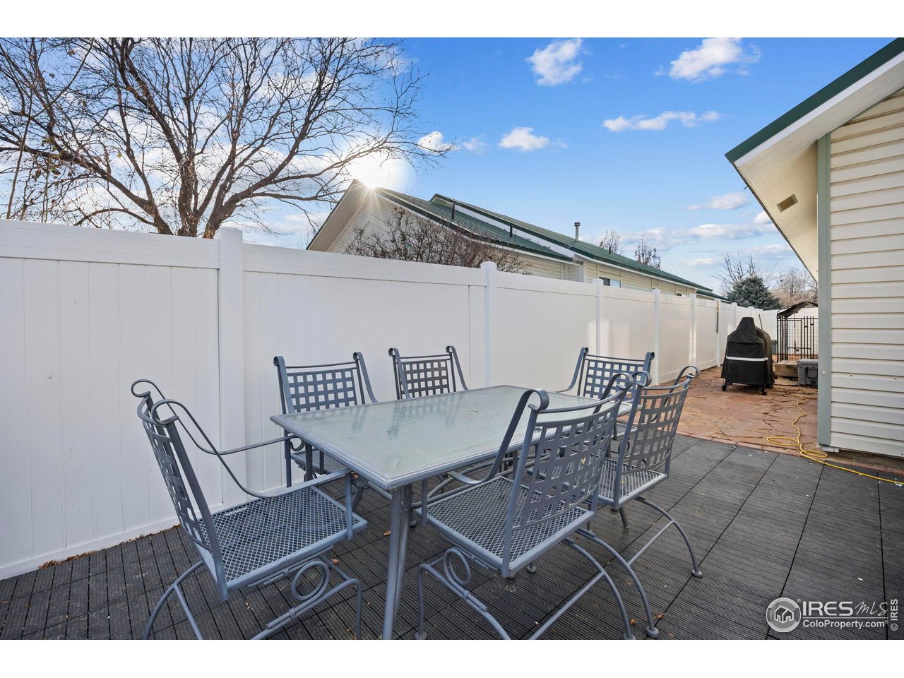 210 2nd Street Mead, CO 80542 - Photo 28 of 29 a view of a dining room with furniture and wooden floor