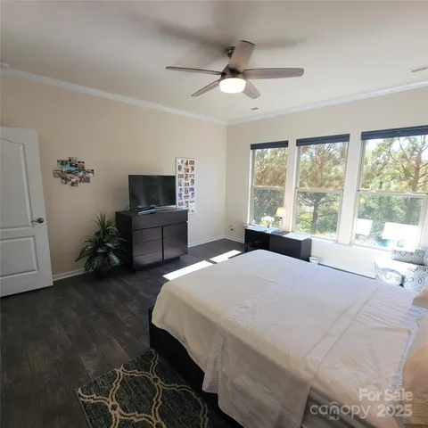 a view of a living room and floor to ceiling window