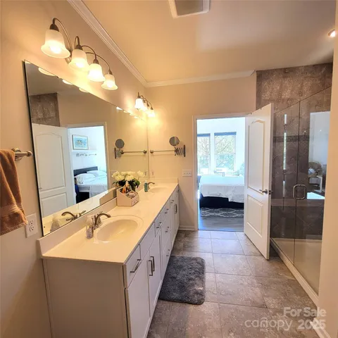 a bathroom with a tub and a shower