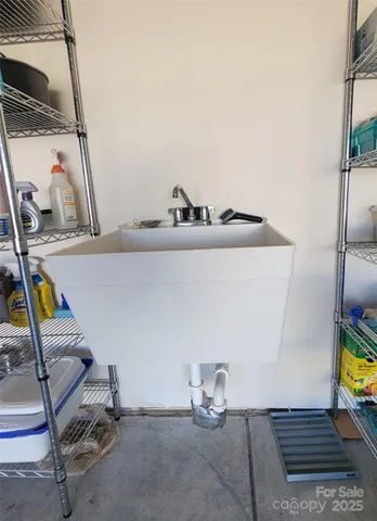 a view of a lake with houses in the background