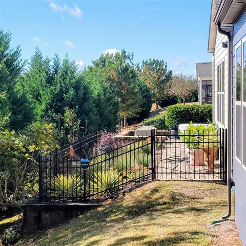 an aerial view of a swimming pool and outdoor space