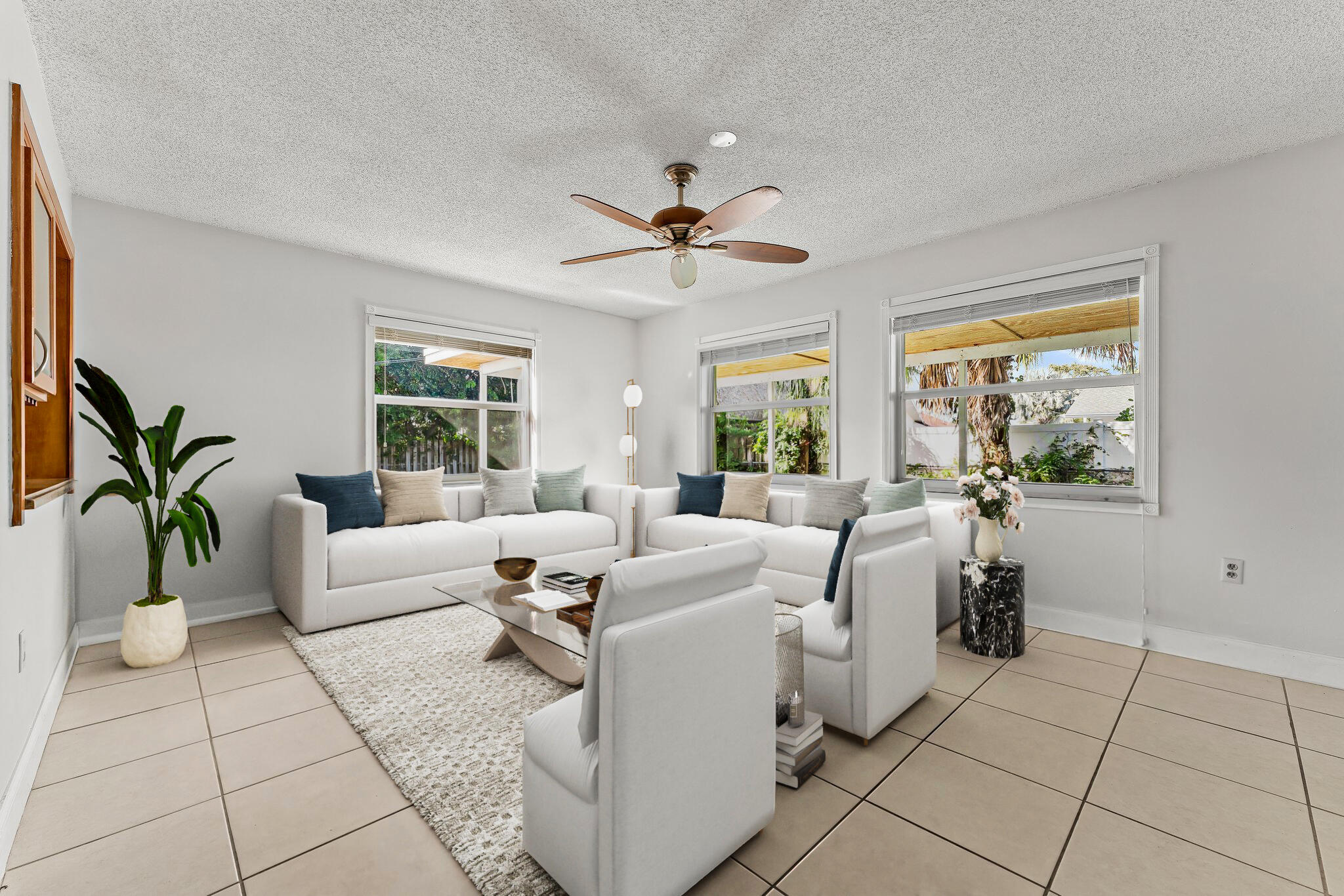 243 West Riverside Drive Jupiter, FL 33469 - Photo 17 of 67 a living room with furniture and a large window