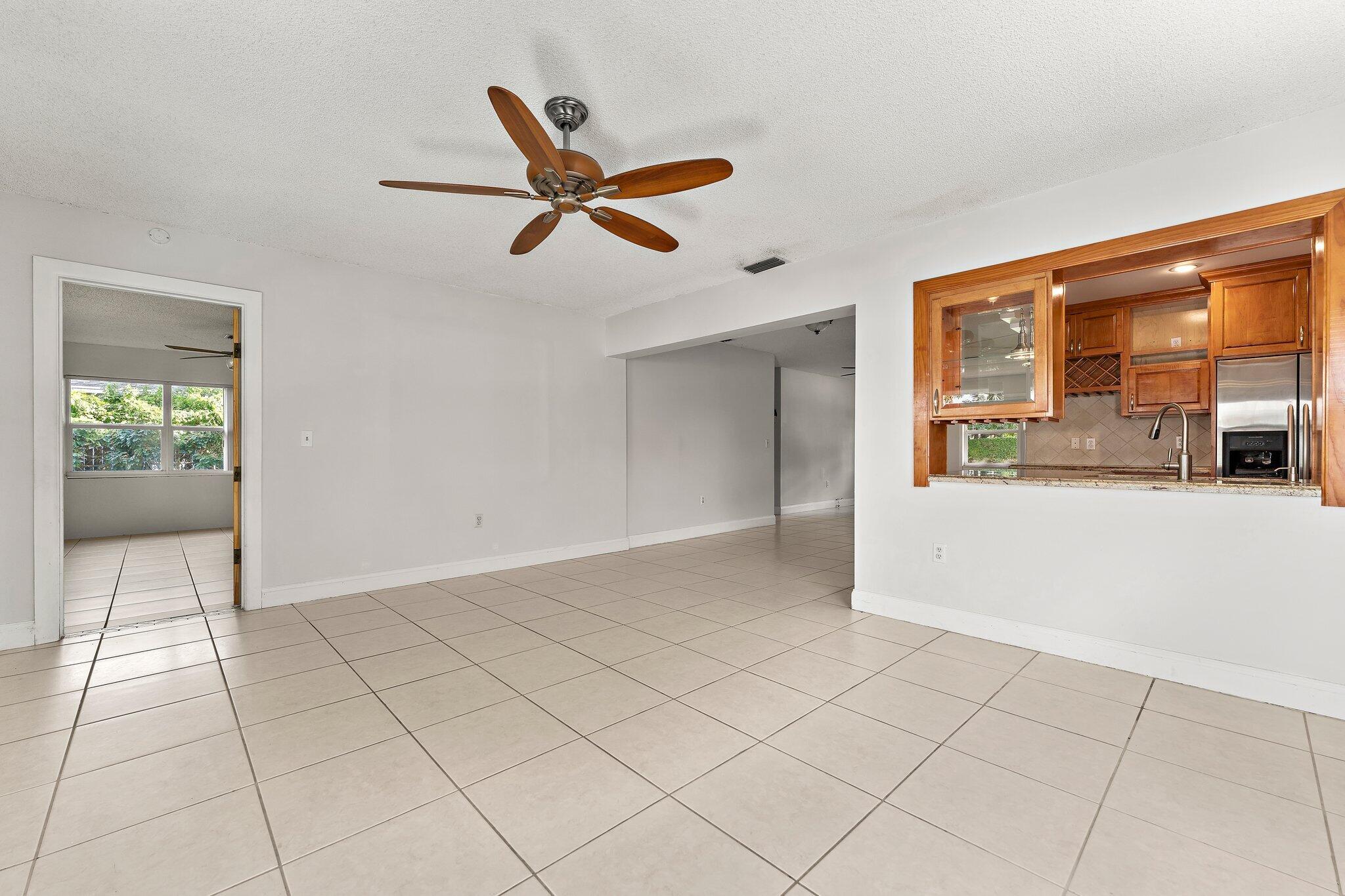 243 West Riverside Drive Jupiter, FL 33469 - Photo 25 of 67 a view of an empty room and window