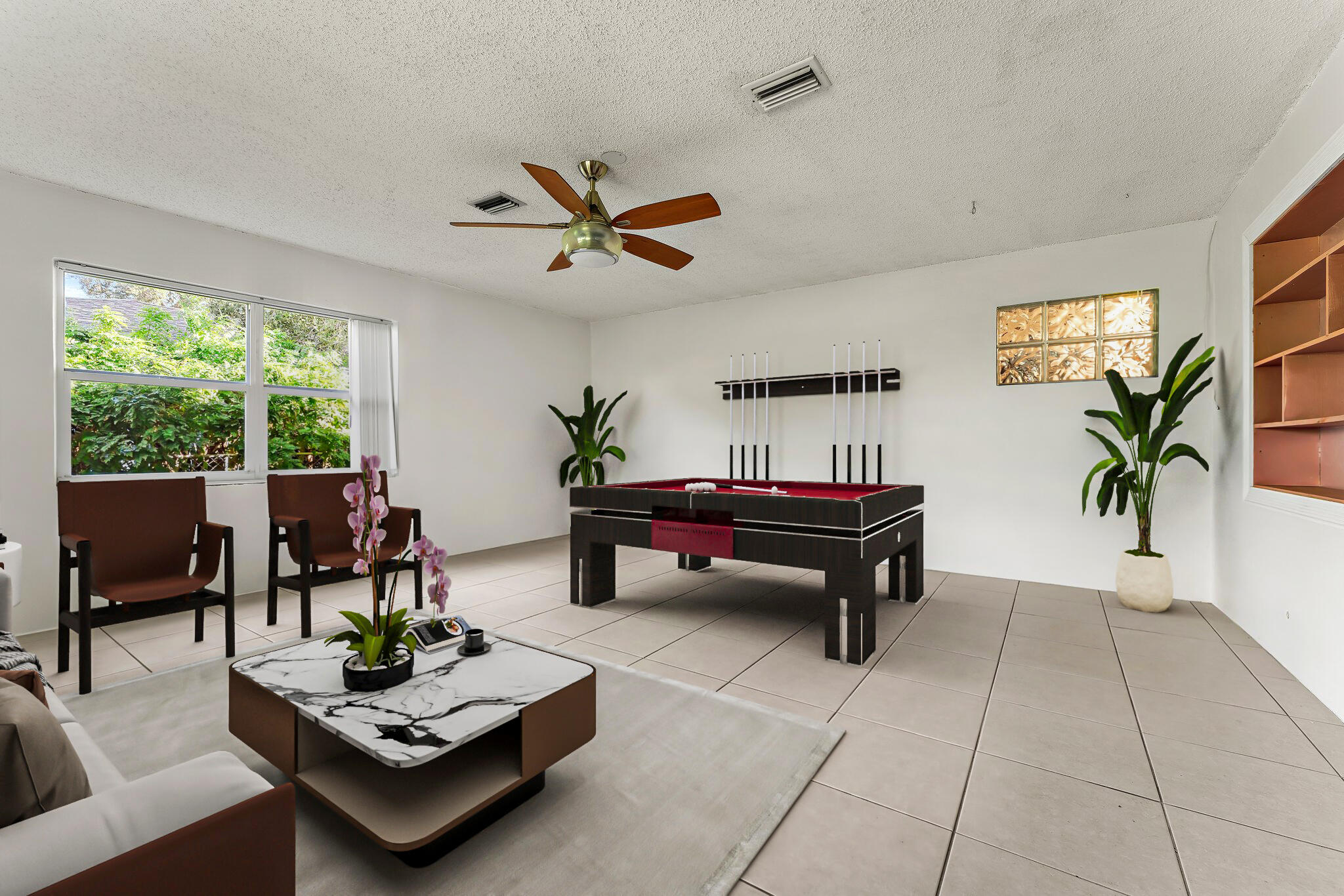 243 West Riverside Drive Jupiter, FL 33469 - Photo 28 of 67 a living room with furniture a rug and a large window