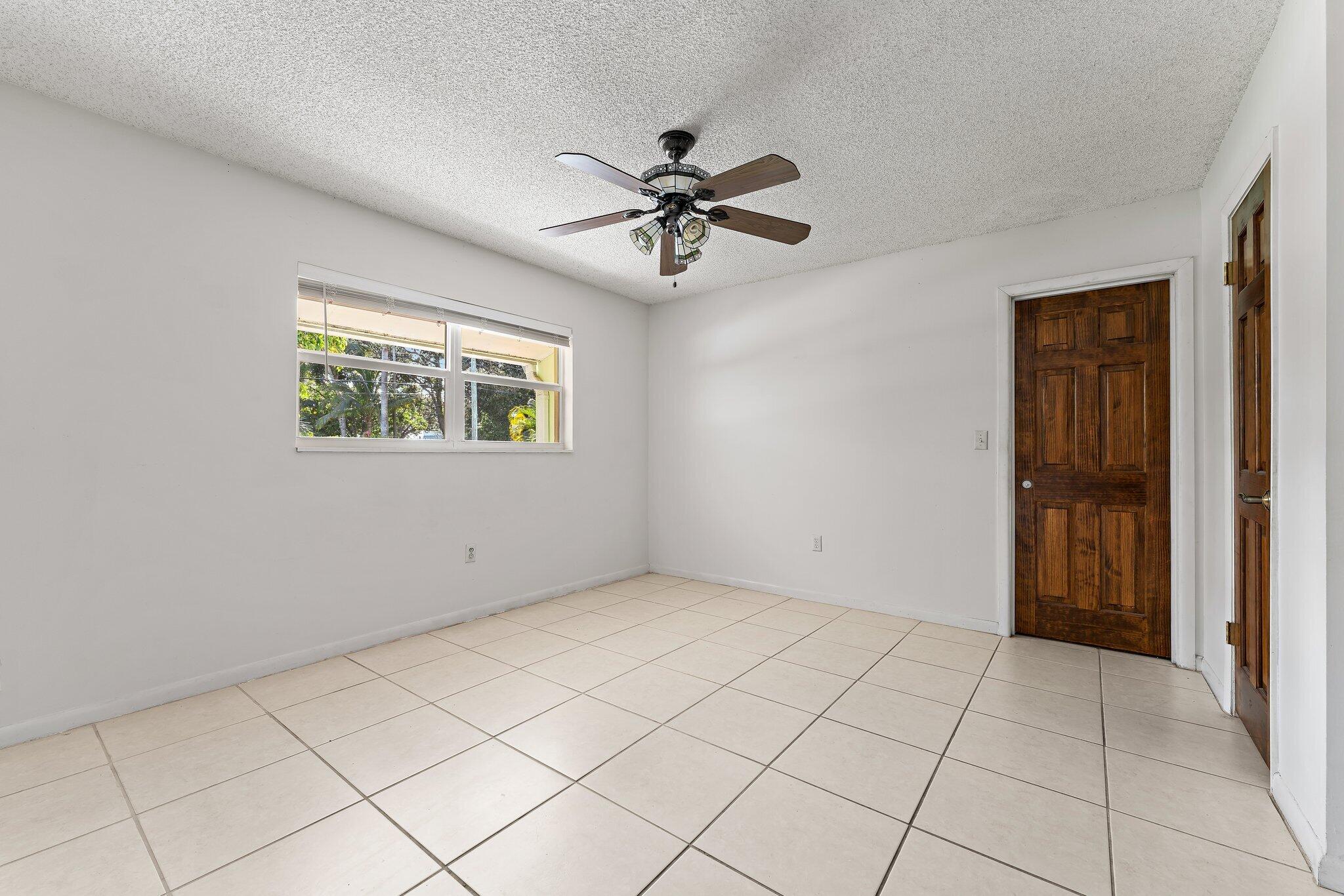 243 West Riverside Drive Jupiter, FL 33469 - Photo 34 of 67 a view of an empty room with a window