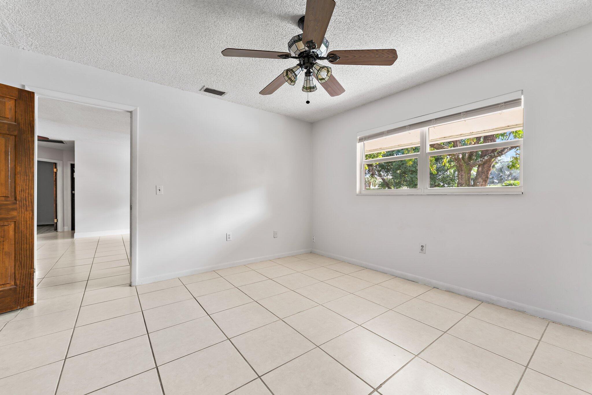 243 West Riverside Drive Jupiter, FL 33469 - Photo 35 of 67 a view of an empty room with a window