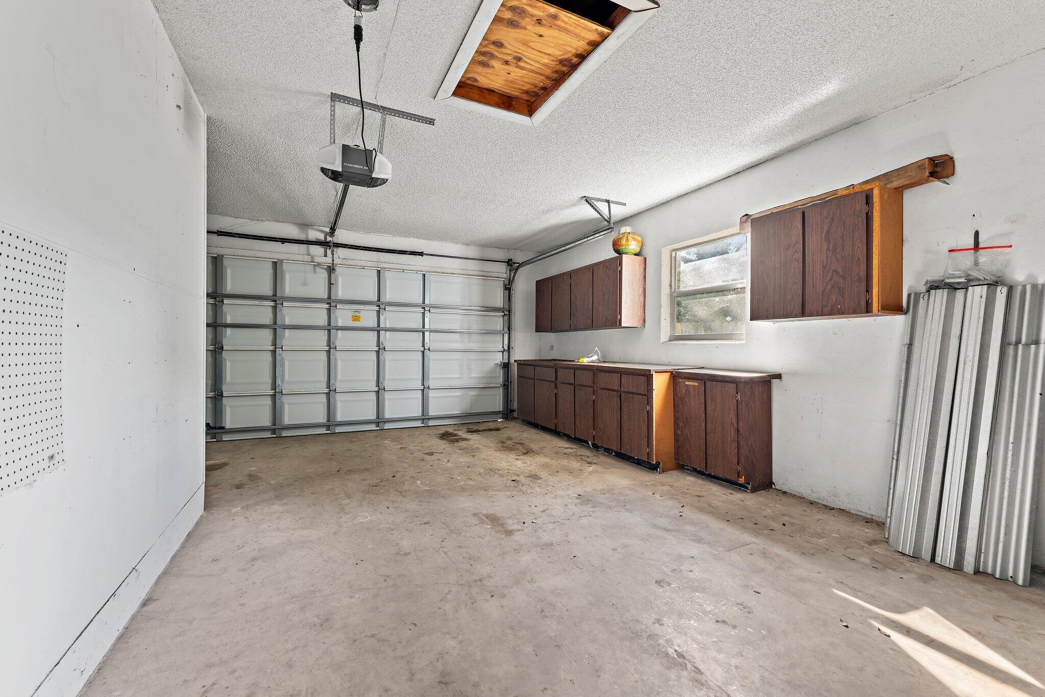 243 West Riverside Drive Jupiter, FL 33469 - Photo 45 of 67 a view of a garage