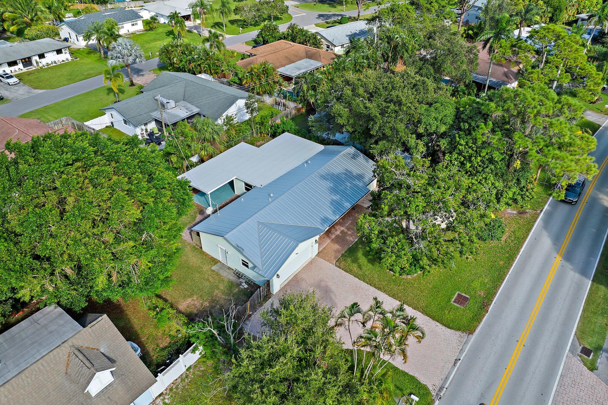 243 West Riverside Drive Jupiter, FL 33469 - Photo 59 of 67 an aerial view of a house