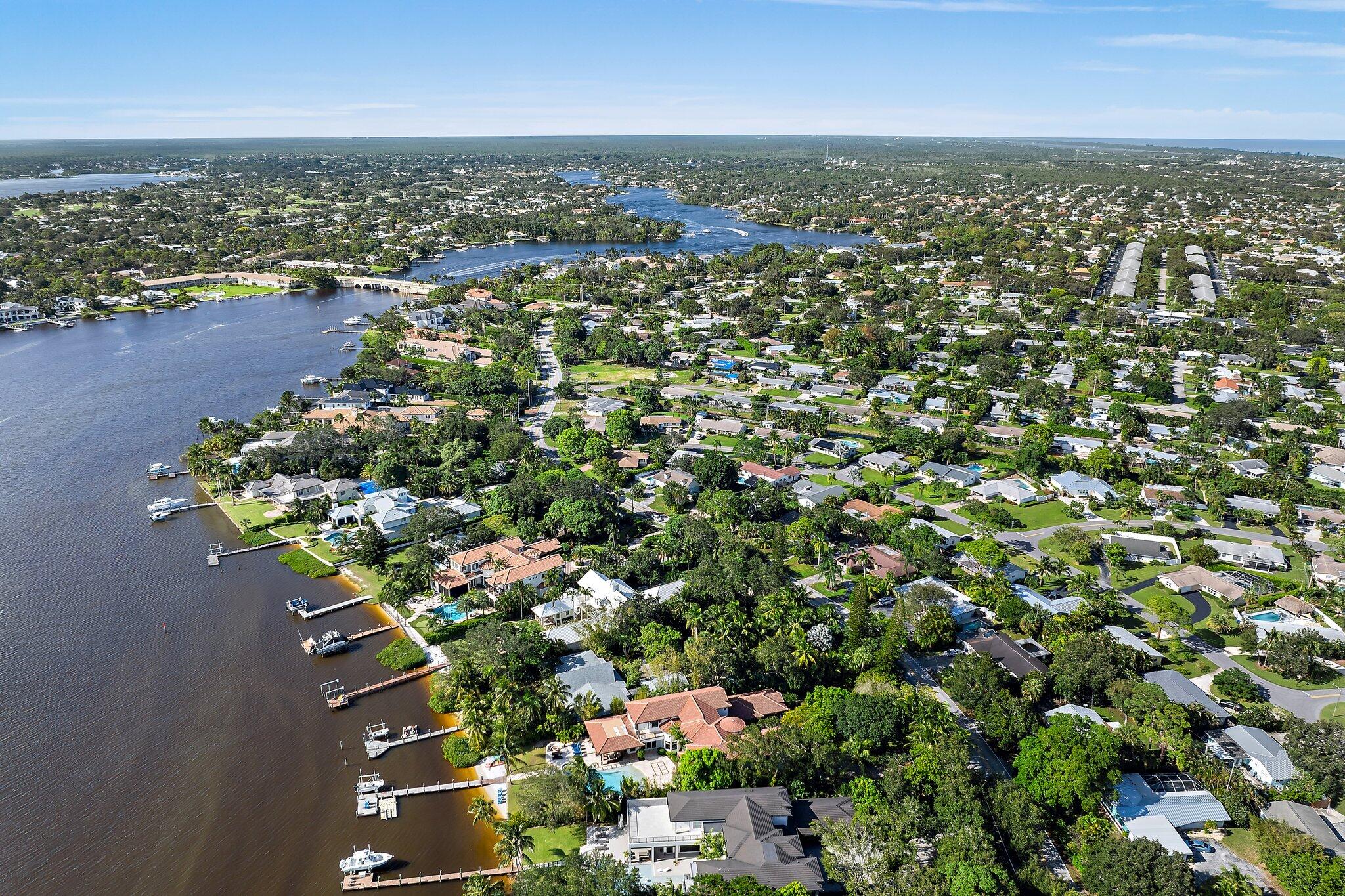 243 West Riverside Drive Jupiter, FL 33469 - Photo 65 of 67 an aerial view of multiple house