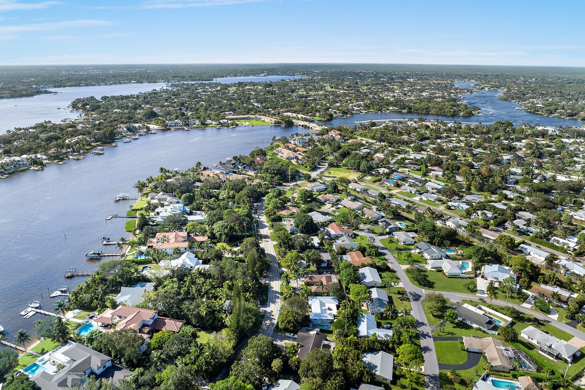 243 West Riverside Drive Jupiter, FL 33469 - Photo 66 of 67 an aerial view of a city with lots of residential buildings