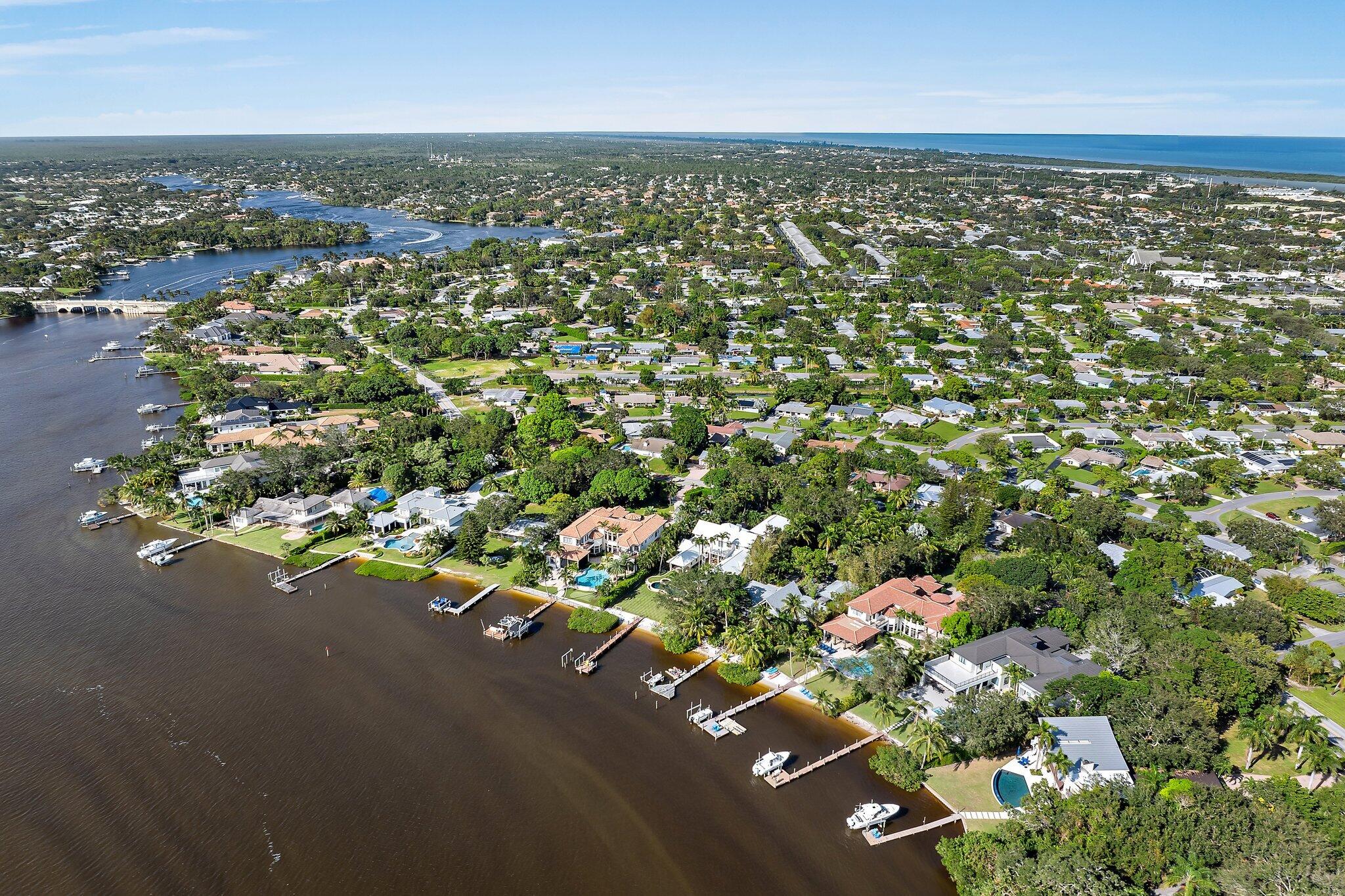 243 West Riverside Drive Jupiter, FL 33469 - Photo 67 of 67 an aerial view of a city with lots of residential buildings