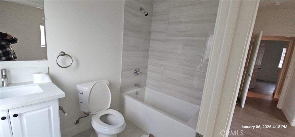 13449 Mesquite Road Whitewater, CA 92282 - Photo 11 of 13 a bathroom with a granite countertop toilet sink and shower