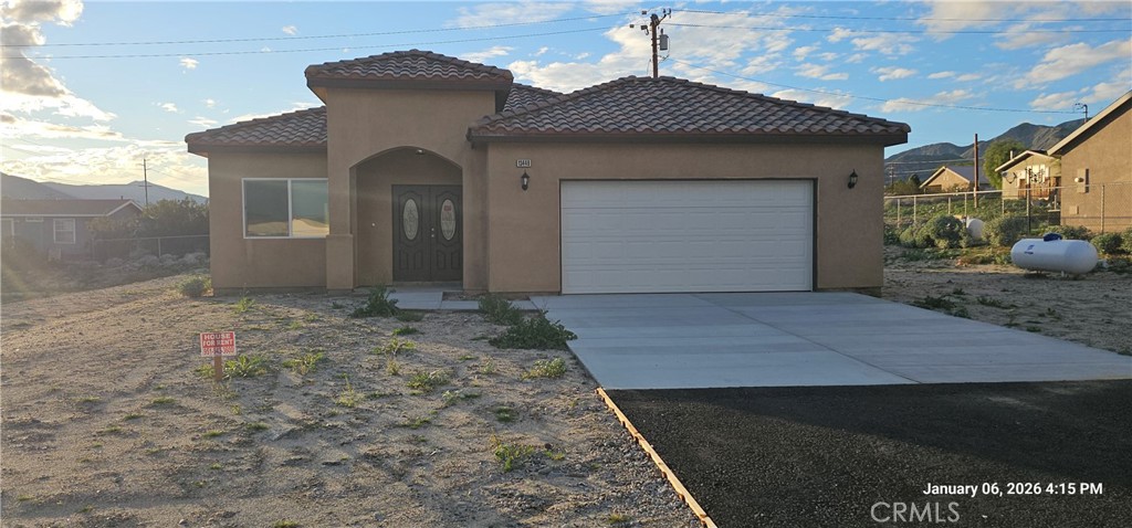 13449 Mesquite Road Whitewater, CA 92282 - Photo 2 of 13 a front view of a house