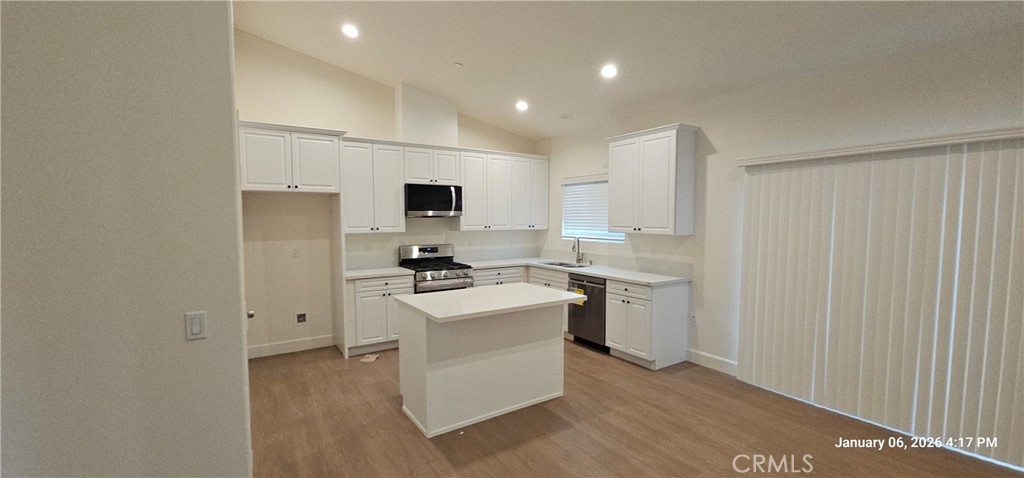 13449 Mesquite Road Whitewater, CA 92282 - Photo 5 of 13 a kitchen with cabinets a sink and appliances