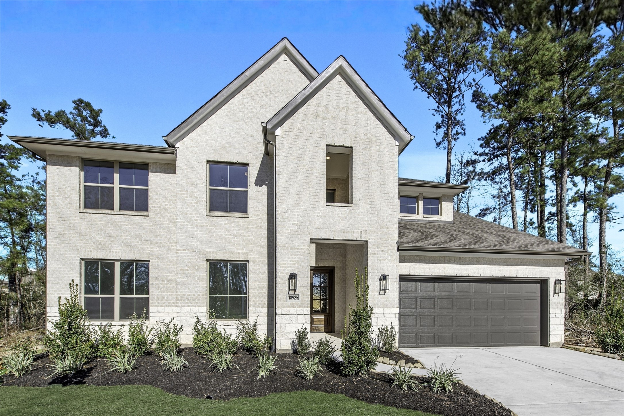 Move in Ready. Westin Homes *New Construction* Collins Plan. Grass is digitally enhanced.