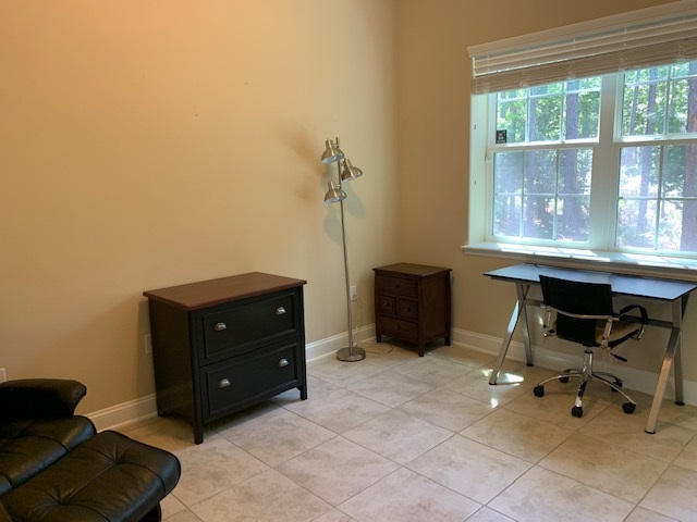 99 CanyonTrail St. Augustine, FL 32086 - Photo 11 of 19 a room with a table and a chair