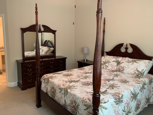 99 CanyonTrail St. Augustine, FL 32086 - Photo 13 of 19 a bedroom with a bed and a dresser