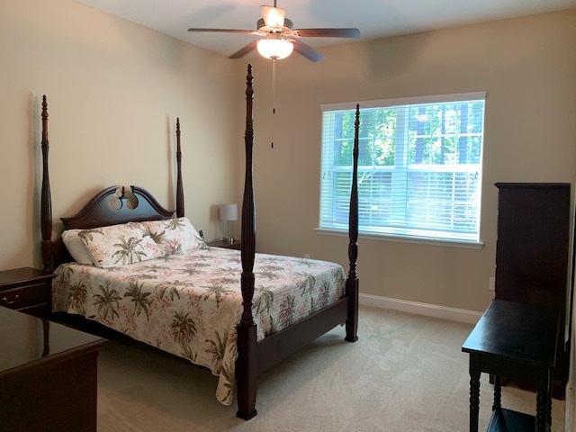 99 CanyonTrail St. Augustine, FL 32086 - Photo 19 of 19 a bedroom with a bed and a window