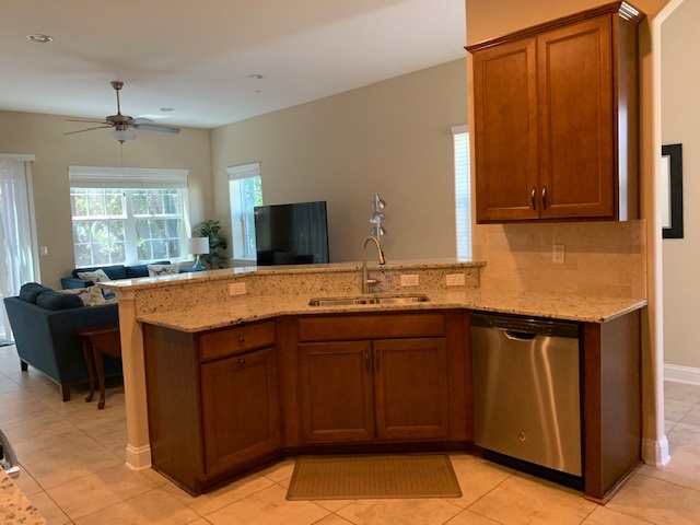 99 CanyonTrail St. Augustine, FL 32086 - Photo 5 of 19 a kitchen with a sink and cabinets