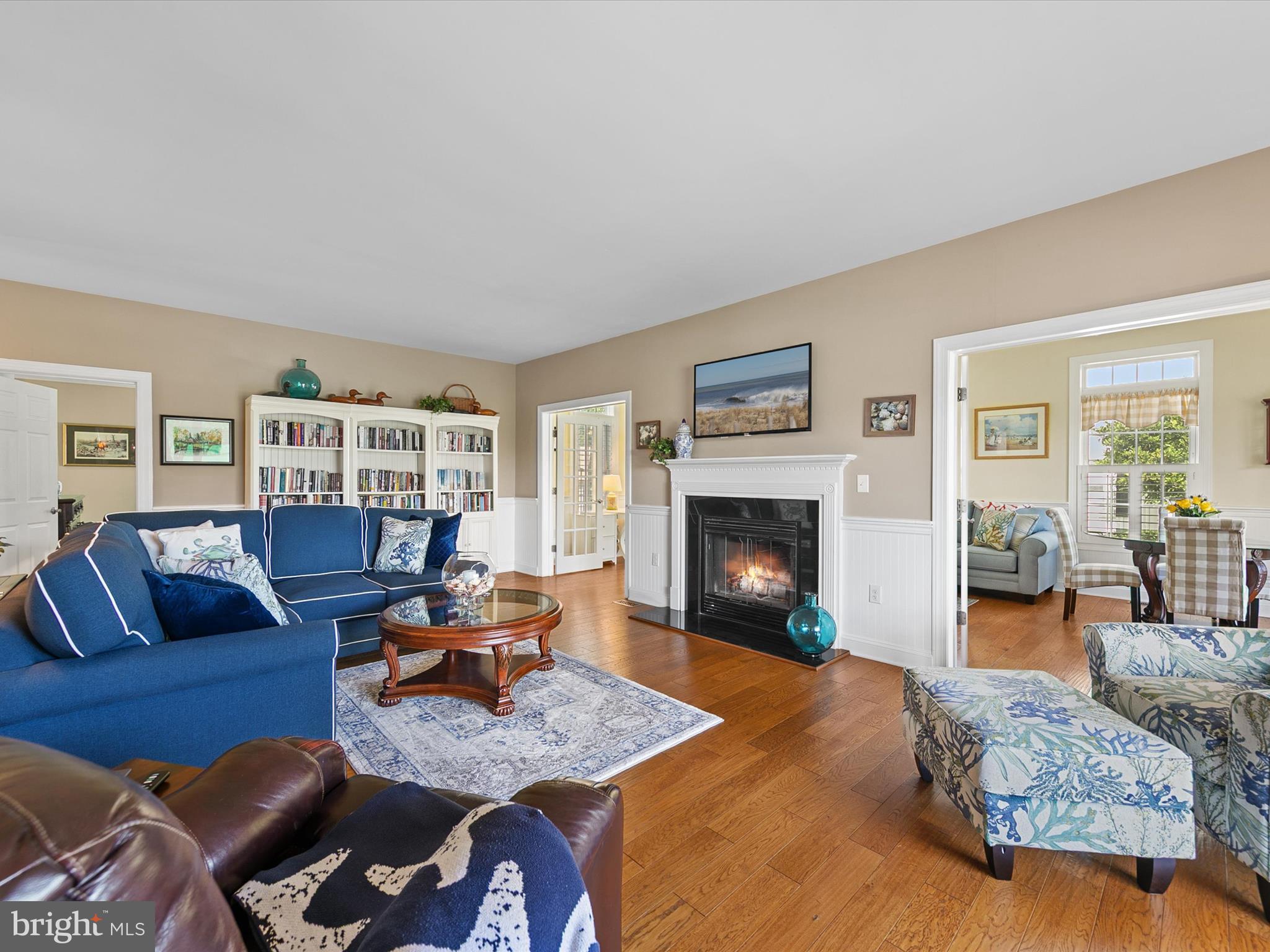 515 Stockley St Extension Rehoboth Beach, DE 19971 - Photo 11 of 104 a living room with furniture and a fireplace