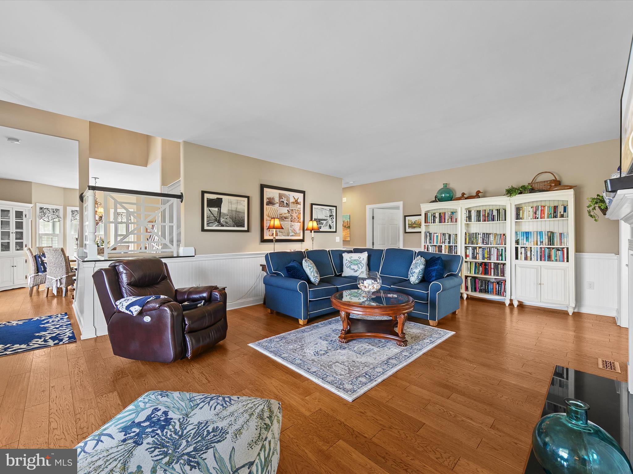 515 Stockley St Extension Rehoboth Beach, DE 19971 - Photo 14 of 104 a living room with furniture and a book shelf