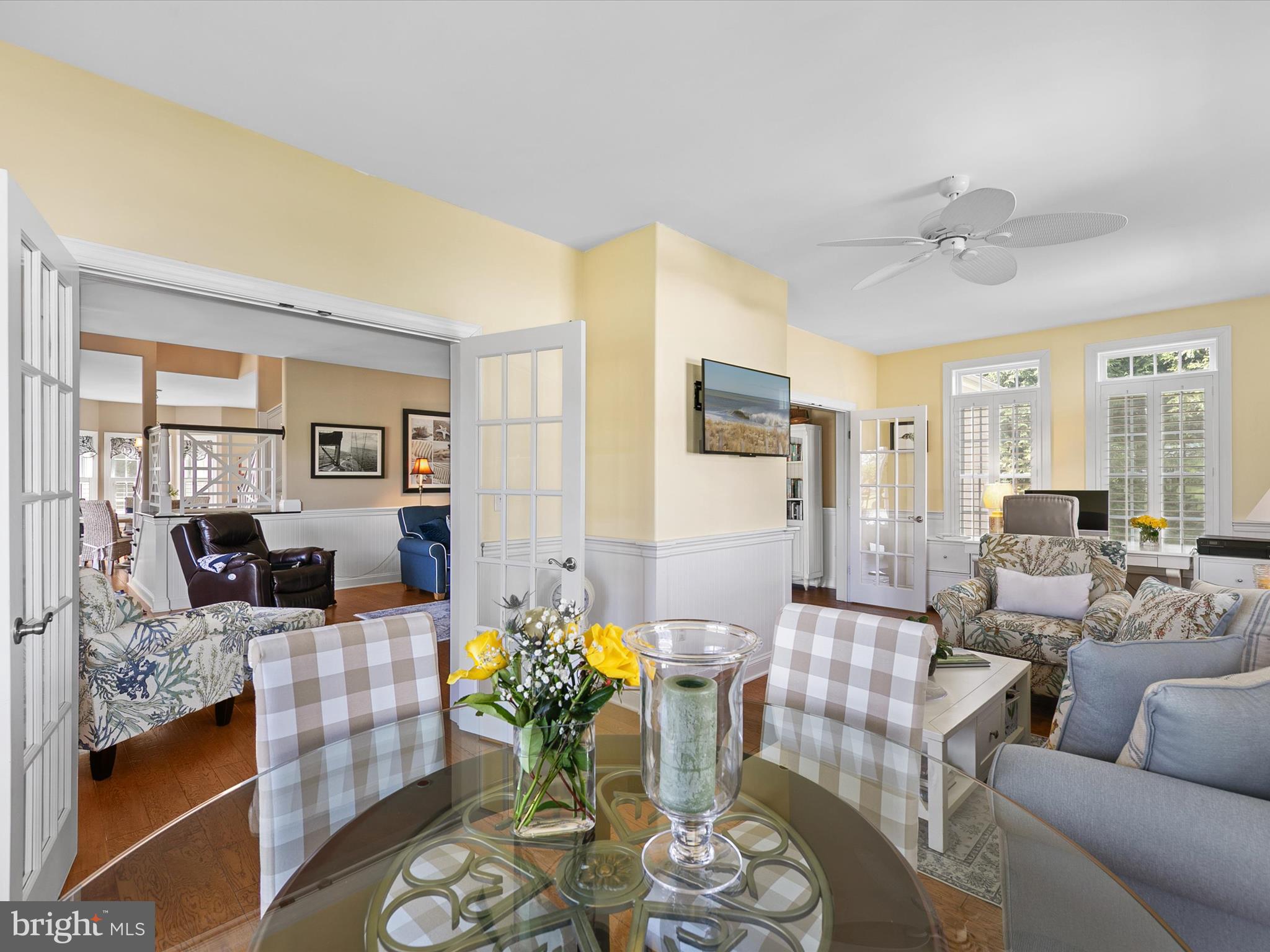 515 Stockley St Extension Rehoboth Beach, DE 19971 - Photo 31 of 104 a living room with furniture potted plant and open kitchen view