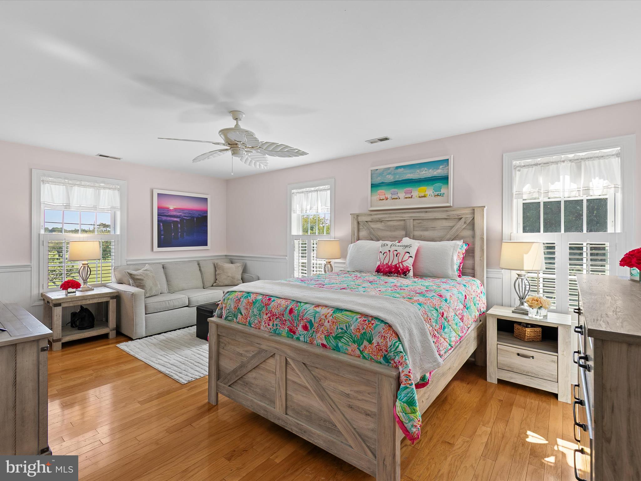 515 Stockley St Extension Rehoboth Beach, DE 19971 - Photo 48 of 104 a bedroom with a bed and wooden floor