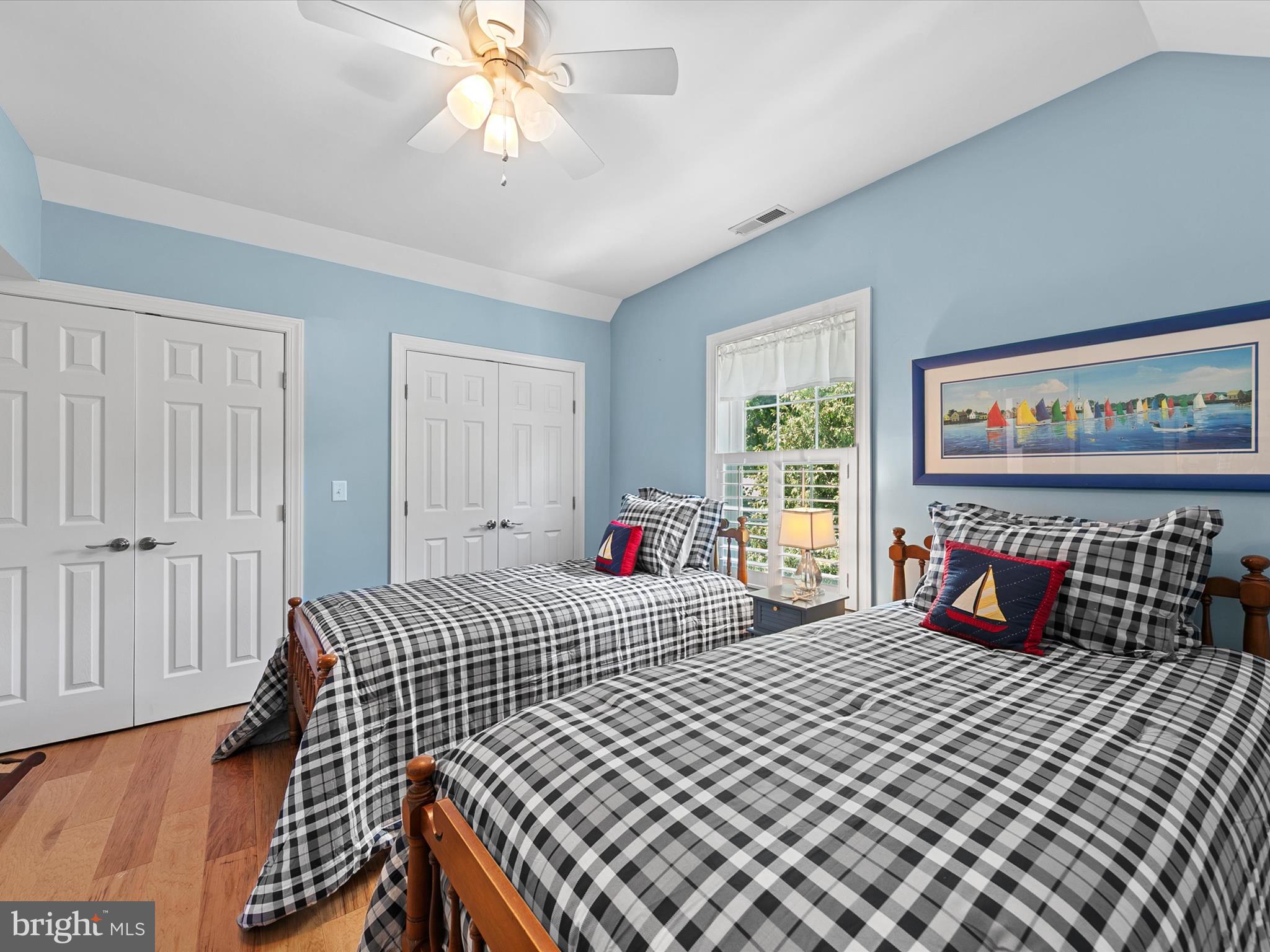 515 Stockley St Extension Rehoboth Beach, DE 19971 - Photo 54 of 104 a bedroom with double bed and a window