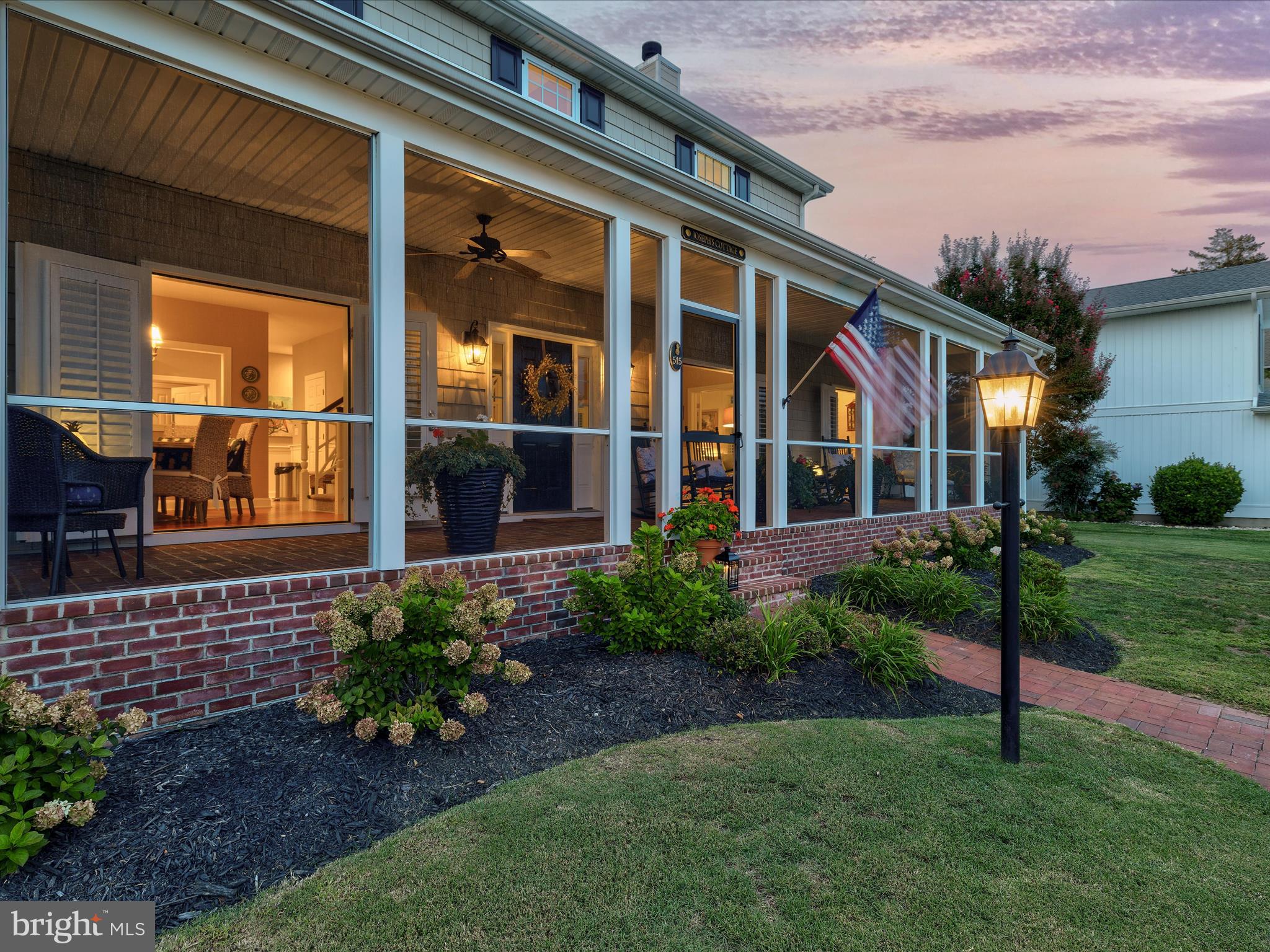 515 Stockley St Extension Rehoboth Beach, DE 19971 - Photo 66 of 104 a view of a house with a yard and plants