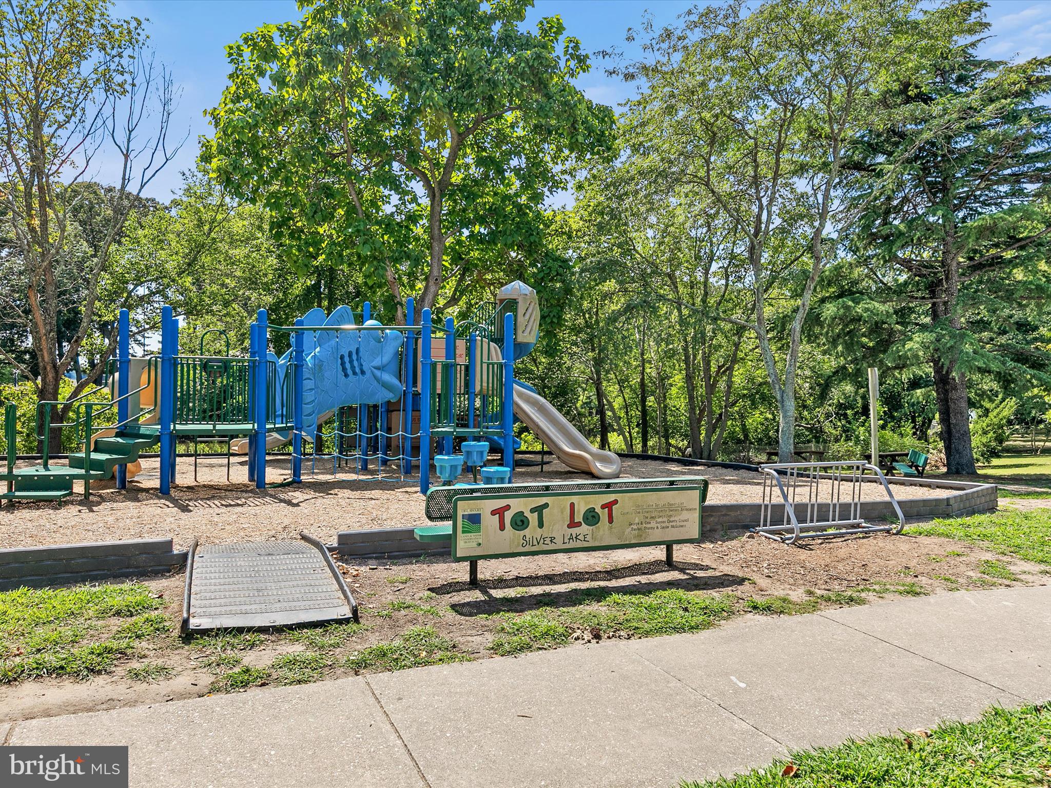 515 Stockley St Extension Rehoboth Beach, DE 19971 - Photo 75 of 104 a view of a park with plants and trees