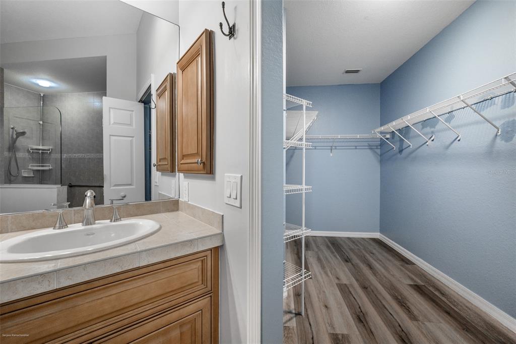3959 San Rocco Drive, Unit 612 Punta Gorda, FL 33950 - Photo 24 of 41 a bathroom with a sink and a mirror