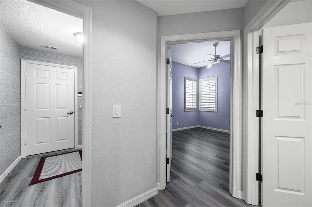 3959 San Rocco Drive, Unit 612 Punta Gorda, FL 33950 - Photo 28 of 41 a view of a hallway with wooden floor and closet