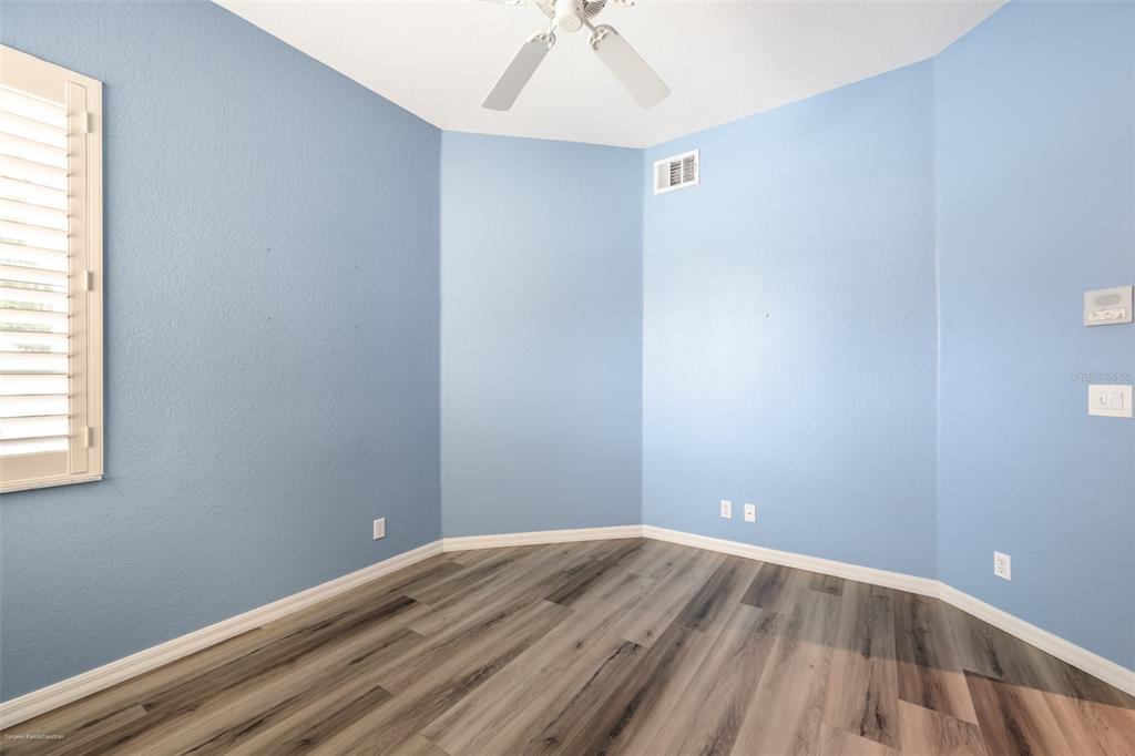 3959 San Rocco Drive, Unit 612 Punta Gorda, FL 33950 - Photo 32 of 41 an empty room with a hardwood and a window