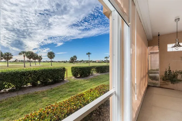 a view of a glass door with a balcony