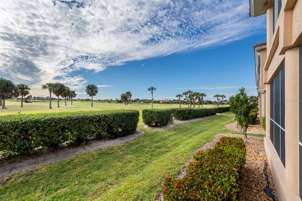 3959 San Rocco Drive, Unit 612 Punta Gorda, FL 33950 - Photo 38 of 41 a view of a garden with lawn chairs