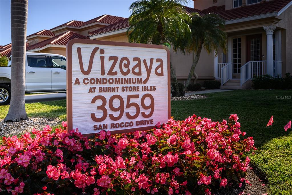 3959 San Rocco Drive, Unit 612 Punta Gorda, FL 33950 - Photo 4 of 41 a sign on the side of a building