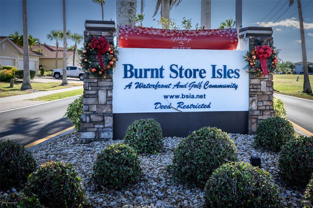 3959 San Rocco Drive, Unit 612 Punta Gorda, FL 33950 - Photo 41 of 41 a sign on the side of a building