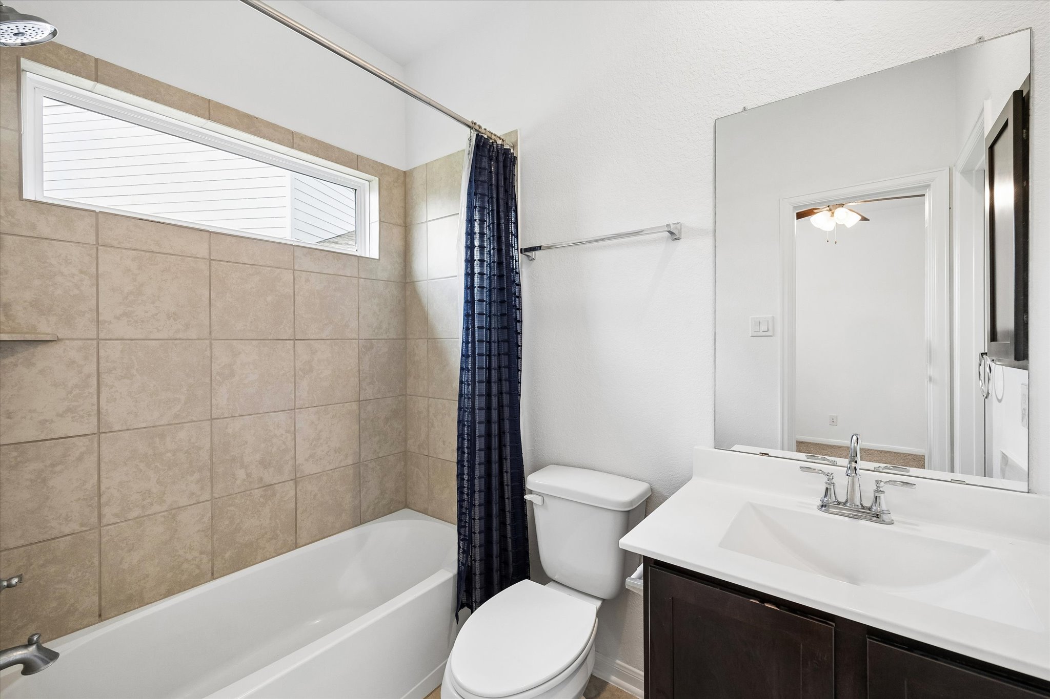 3354 Harmony View Lane Spring, TX 77386 - Photo 10 of 18 a bathroom with a sink toilet vanity and shower