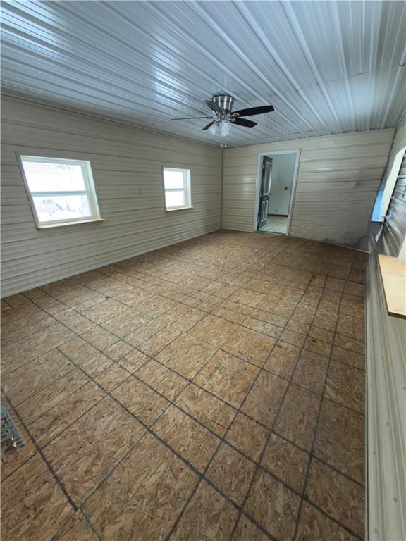 455 Adrian Sherrett Road Adrian, PA 16210 - Photo 12 of 16 a view of a livingroom with an empty space and a window