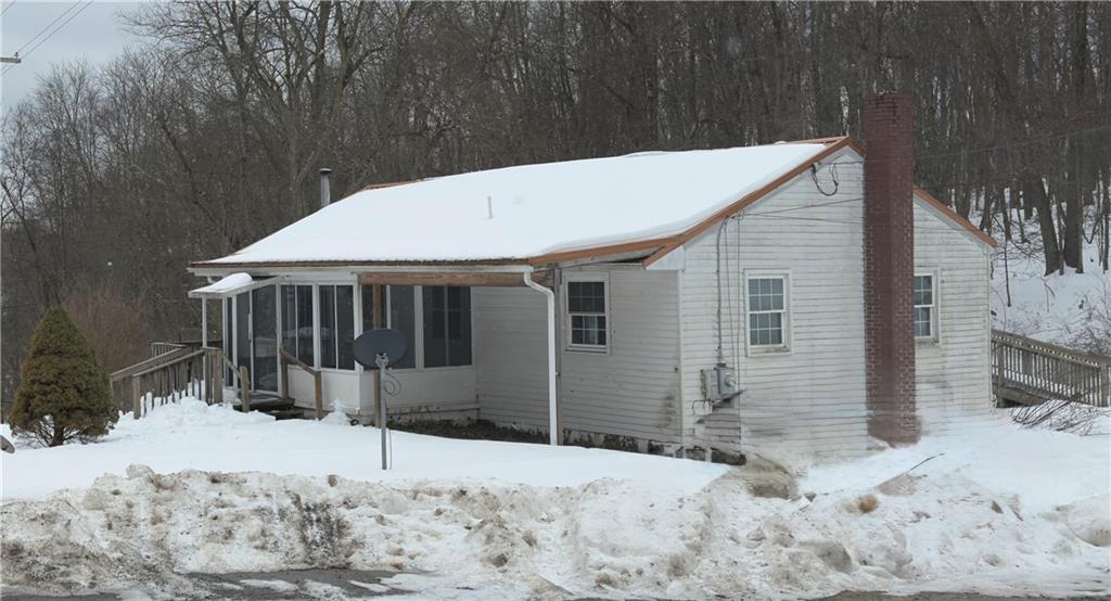 455 Adrian Sherrett Road Adrian, PA 16210 - Photo 2 of 16 a backyard of a house