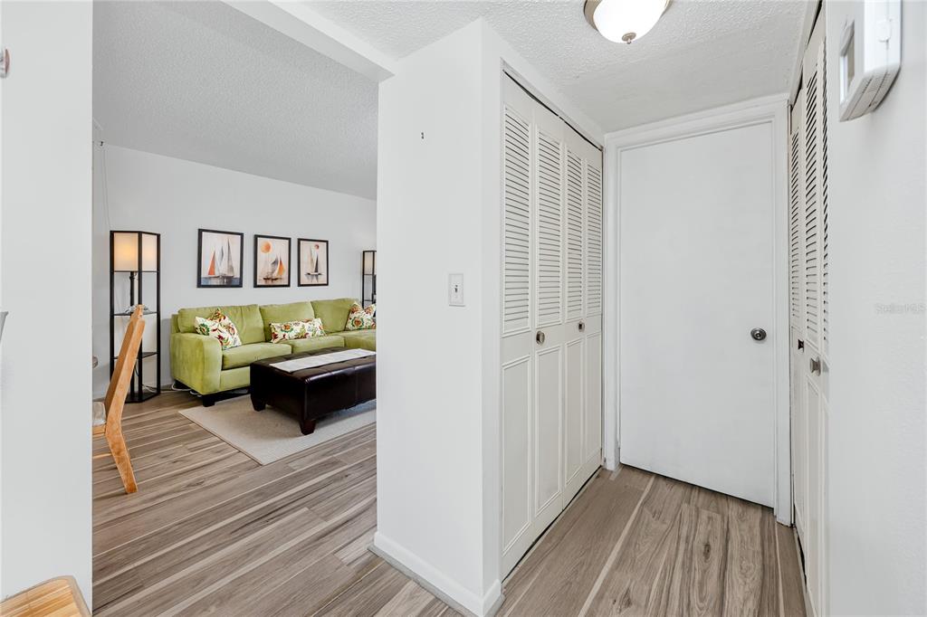 2207 Belleair Road, Unit B30 Clearwater, FL 33764 - Photo 22 of 39 a bedroom with furniture and a gate