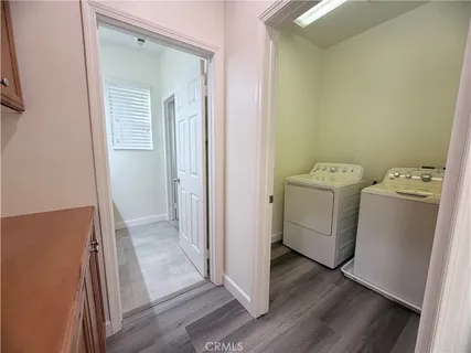 a bathroom with a double vanity sink and mirror