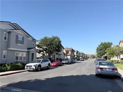 a view of a house with a street