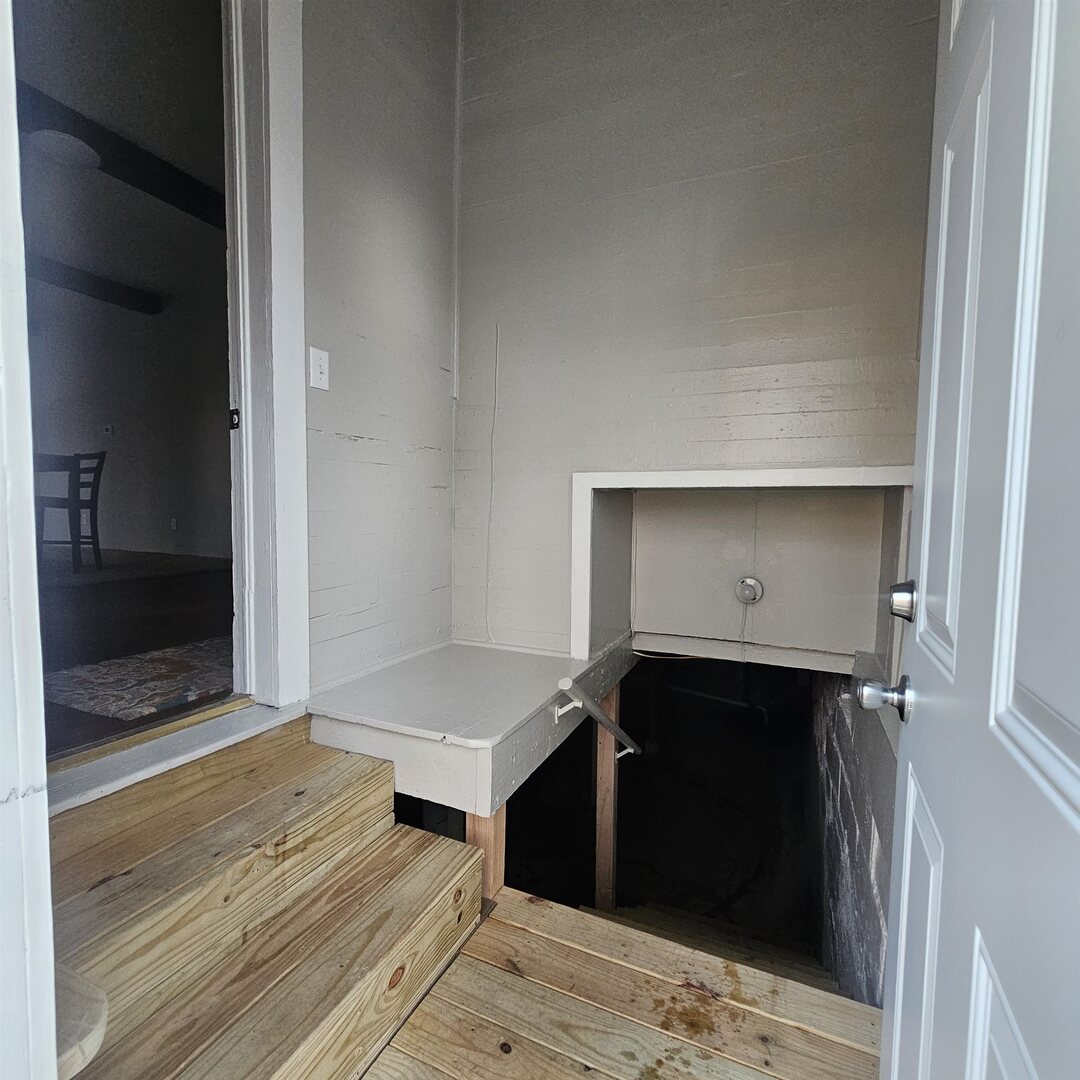 625 North 12th Street Mount Vernon, IL 62864 - Photo 26 of 26 a living room with a bed and a walk in closet