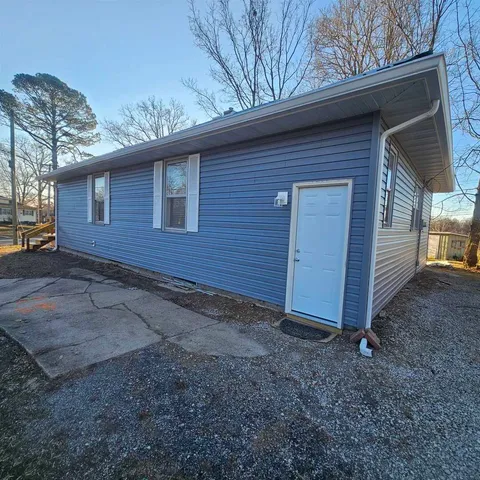 a view of backyard of house