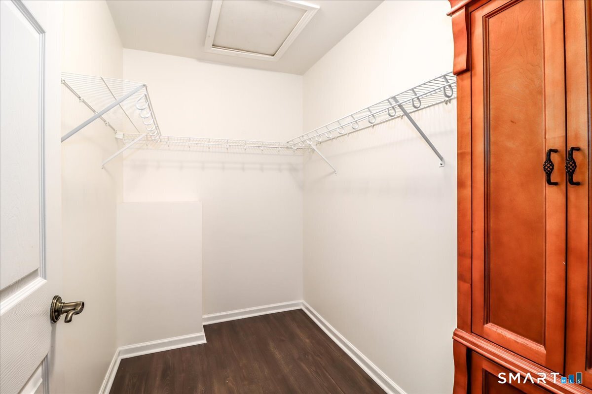 87 Haley Lane, Unit 87 Newtown, CT 06482 - Photo 20 of 39 a view of small space with racks on the wall